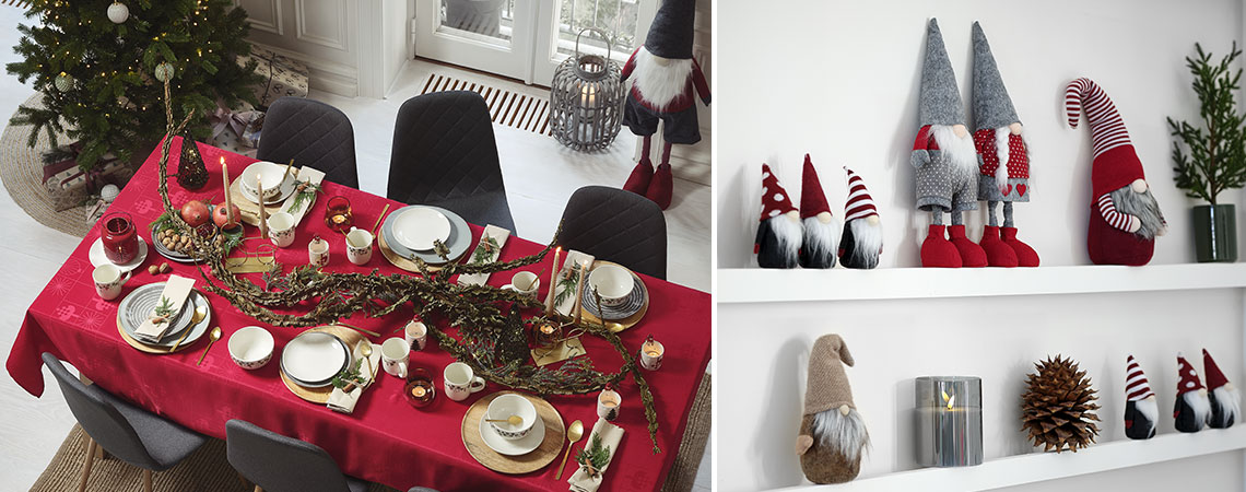 Blagovaonski stol ukrašen za Božić božićnim drvcem i patuljcima