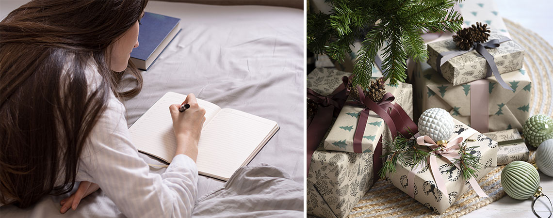 Žena koja pišu popis za kupovinu i božićni darovi pod drvcem
