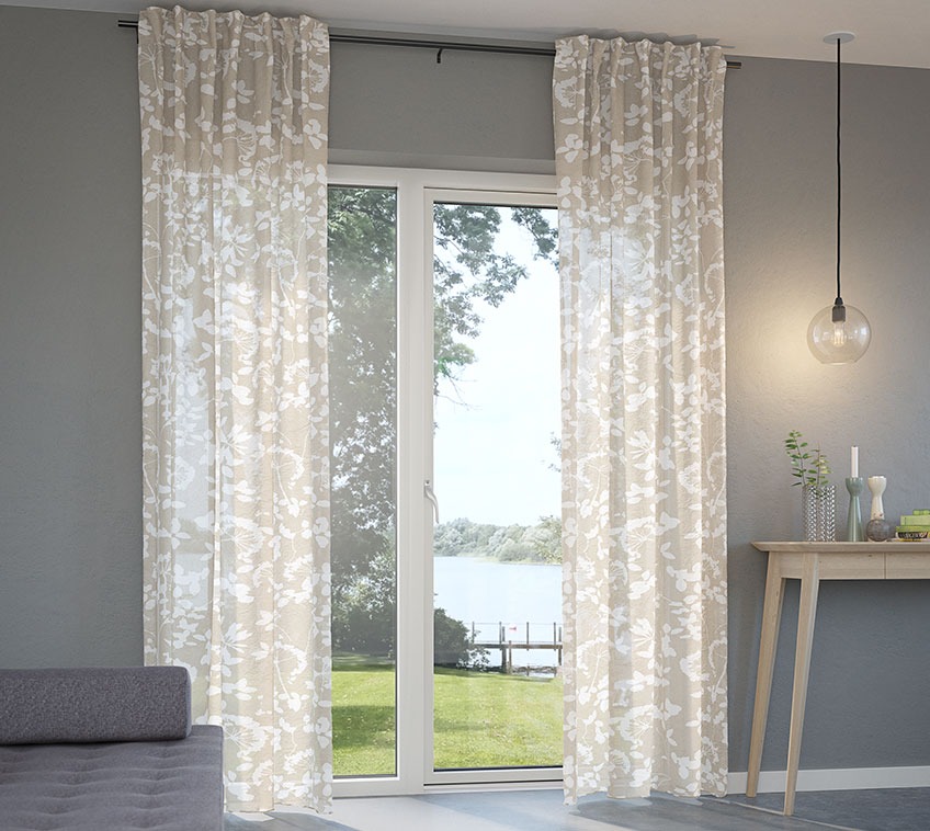 Lightweight curtains in front of a patio door