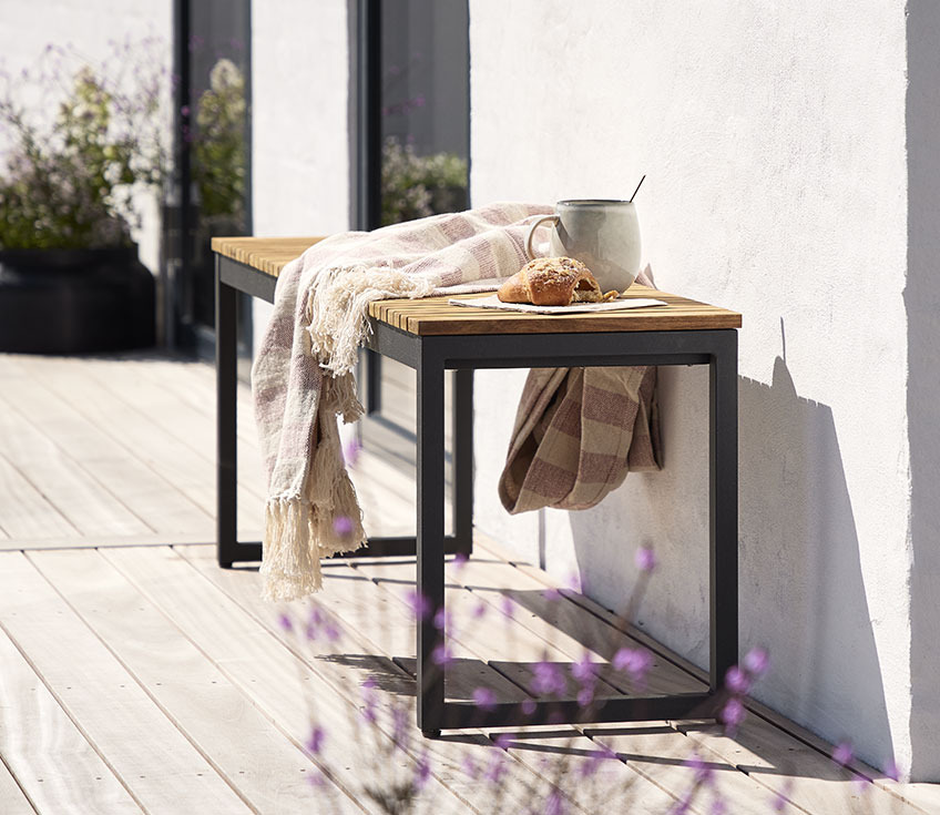 UGILT bench with AMASONLILJE throw and SVERRE mug Bench in steel and hardwood